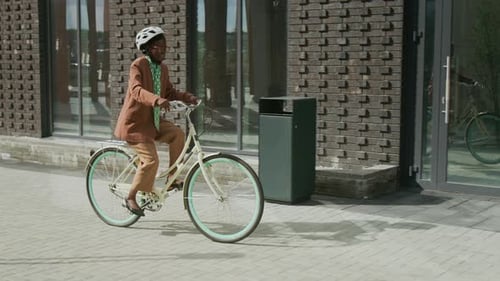 Active Office Worker Riding to Work by Bicycle