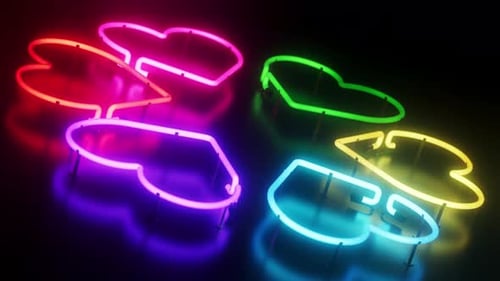 Rotating 3D Rendered Colorful Neon Heart In Circular Pattern Over Black Background Loop