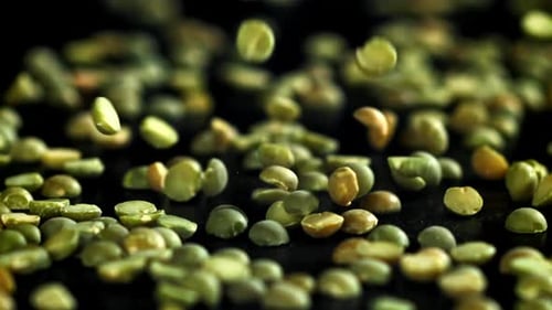 Green Peas Fall on the Table Filmed on a Highspeed Camera at 1000 Fps