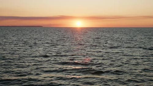 Bright Colorful Sunset Over Ocean Horizon With Clouds, 4K Slow Motion