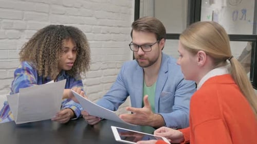 Multiethnic Business People Talking in Office