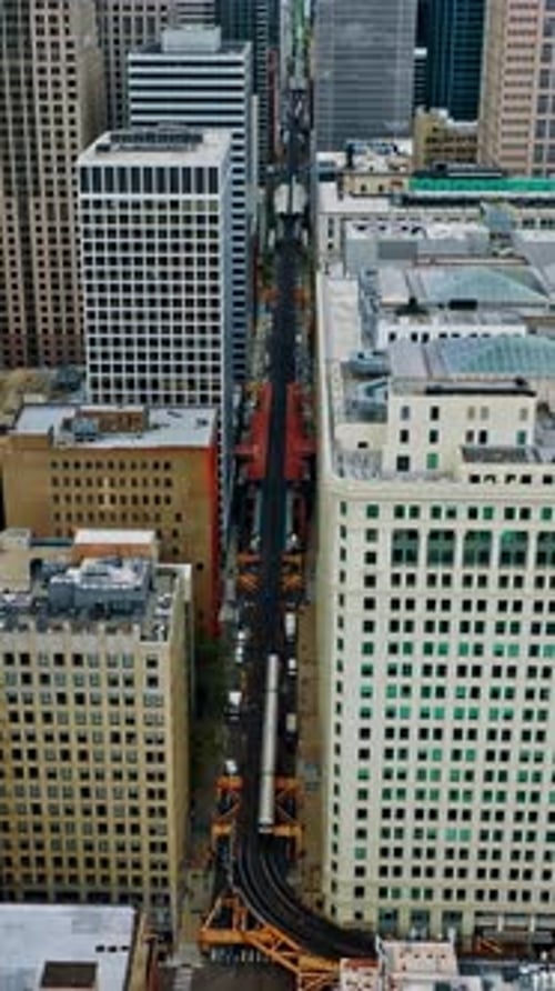 Aerial view of Chicago's skyline and train tracks