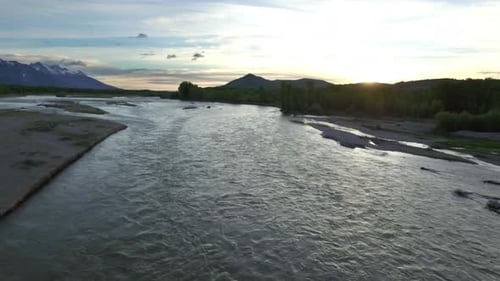 Drone View of Sunset Sky with Snowcapped Mountains and River 6 Above