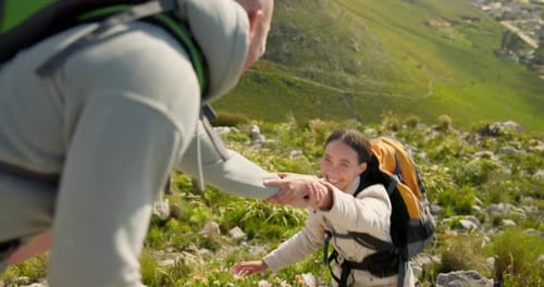 Couple hiking, helping and mountains for rock climbing, adventure and travel with fitness