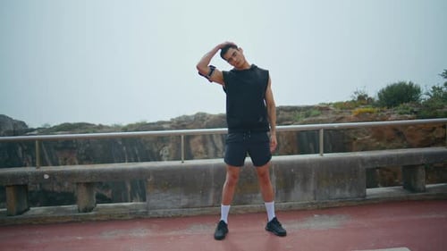 Athletic Man Doing Stretching in Nature Park Strong Fit Guy Training Outdoors