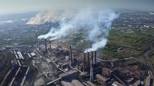 Aerial Panoramic View of Industrial Zone with Large Factory Pipes