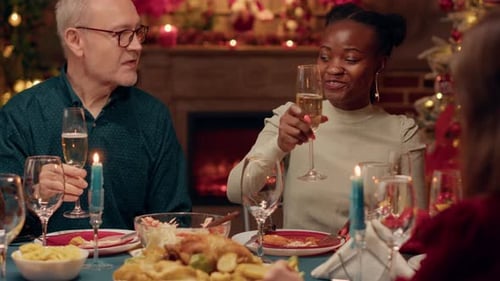 Joyful Family and Friends Celebrate Christmas Dinner