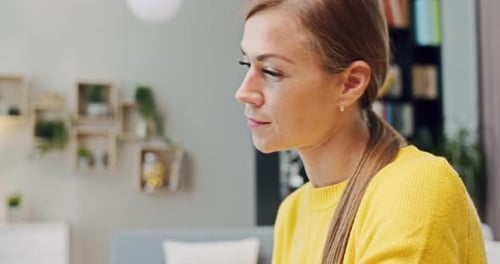 Close Up of Pretty Young Caucasian Woman Working at Laptop and Taking on Headphones Goodlooking
