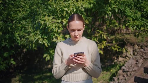 Focused Girl Chatting Smartphone at Park Closeup Young Lady Answering Message