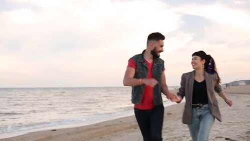 Romantic Couple Running Holding Hands on White Sand Beach Near Sea in Slow Motion Boyfriend and