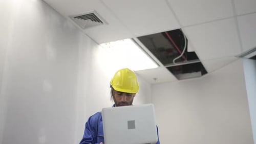 Engineer is working at tower.