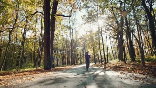 Caucasian Man on a Morning Jog in the Park