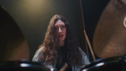 Portrait Woman Rock Drummer Plays Rhythm in Drum Kit Musician Female Beating Drum Session in