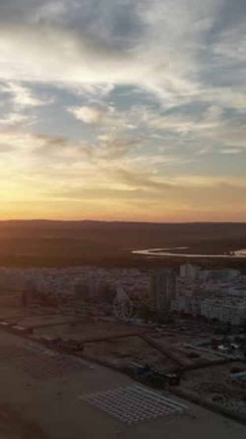Vertical Video of sunset on the beach in Monte Gordo. Algarve, Portugal