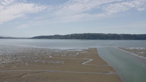 Skagit Bay Low Tide Mud Flats Aerial Flight Towards Open Water