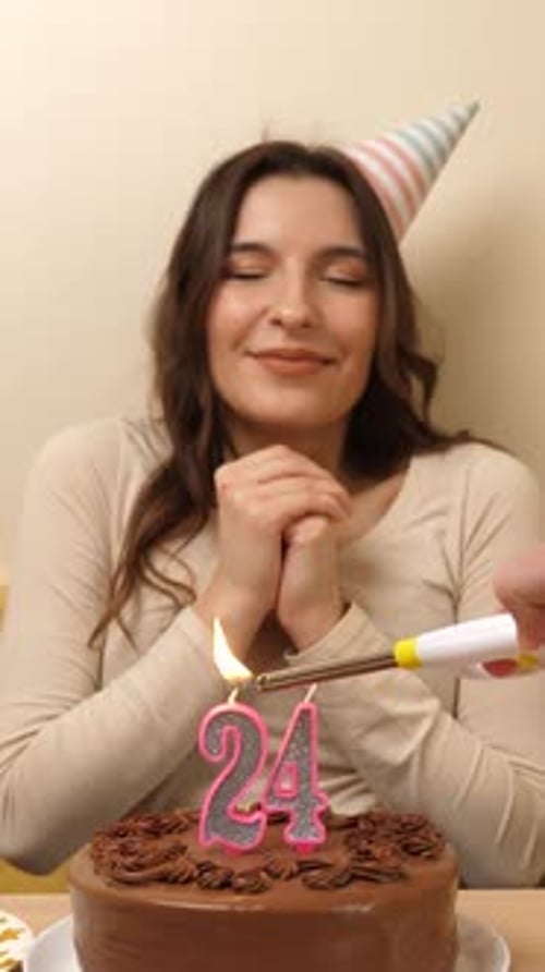 Excited Woman Celebrates Birthday with Chocolate Cake