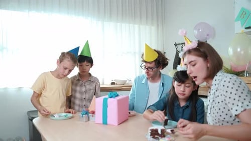 Family Celebration with Birthday Cake and Gifts