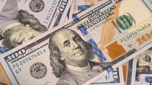 Hundred dollars, American banknotes rotate close-up. USA dollars money. 100 dollar bills