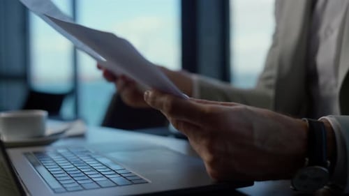 Businessman Hands Holding Papers in Marine View Office Closeup. Unknown Entrepreneur Sitting