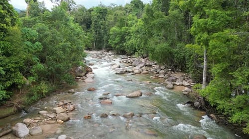 Picturesque perspective as drone reveals river's cascade.