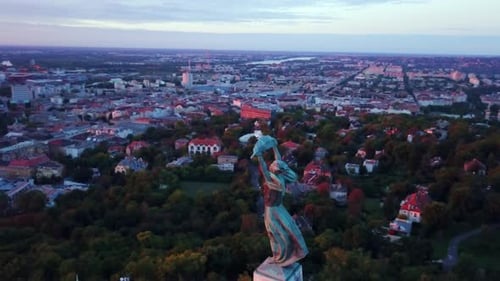 Budapest liberty statue and view of the early sun over the city