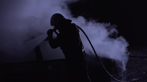 Firefighter Combating Flames