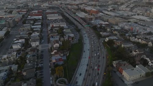 High Angle View of Heavy Traffic on Multilane Freeway in City at Twilight
