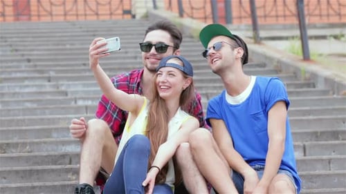 Friends Taking Selfie on City Steps
