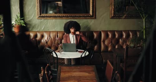 Drink, laptop and business with woman in cafe for remote work, restaurant branding and research