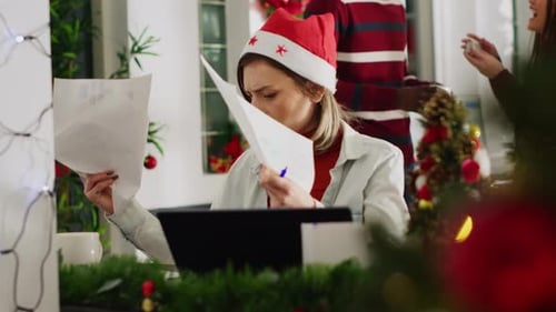 Woman Perturbed By Coworkers in Office