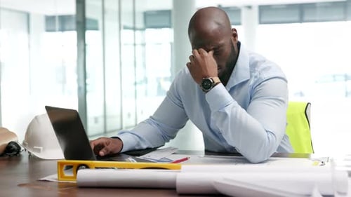 Stress, anxiety and worry with an architect, builder or contractor suffering from a headache