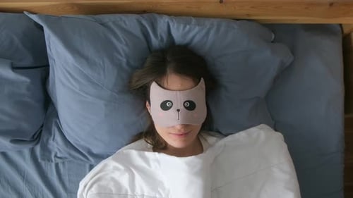 Smiling Woman Wakes Up, Removes Panda Sleeping Mask