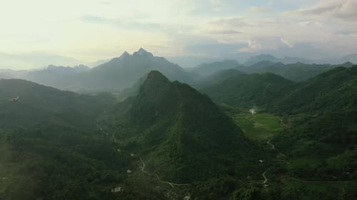 Mountains, woods and drone with hills, road and landscape scenery in country