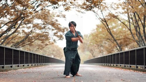 Japanese, man or samurai with wooden sword for combat practice, strike or slash in shogun culture