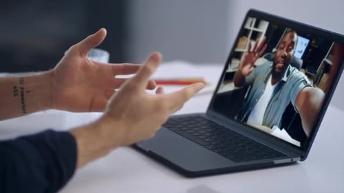 Startupers Video Calling Laptop at Office Closeup Freelancer Greeting Colleague