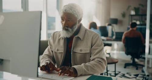 Business, man and typing on computer in office for research, review article and editing draft