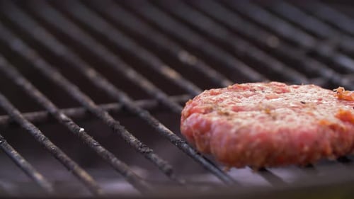 Cooking, Barbecue and Fast Food Concept - Hand Putting Processed Cheese For