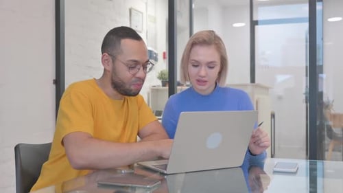 Multi Ethnic People Doing Video Chat on Laptop