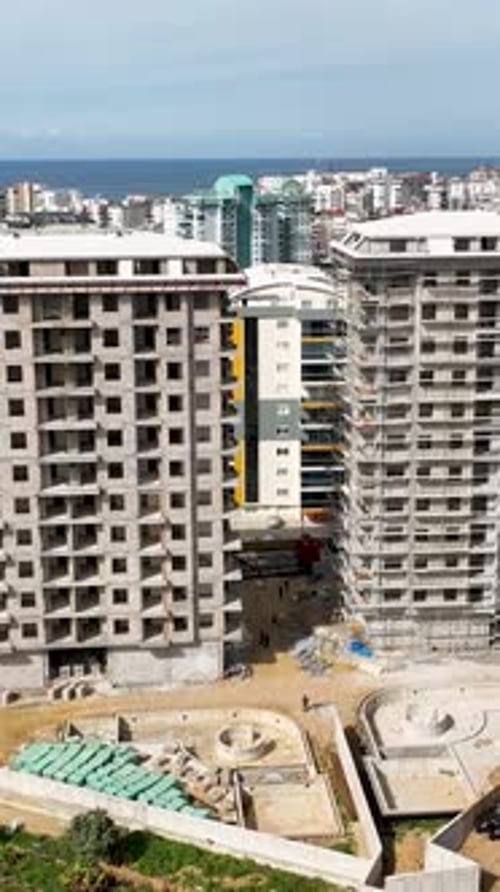 Vertical Video Aerial Construction Progress Building Site of a MultiStory Residential Project