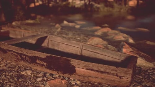 A Boat Sitting on Top of a Sandy Beach