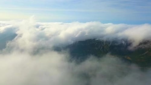 A bird's view of Picos: Peaks sculpt the horizon, a rugged poem etched in stone