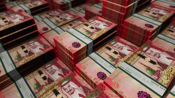 Saudi Arabia Rial 100 banknote packs - flying over SAR money stack ...