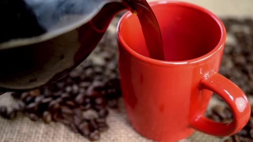 Pouring Coffee Into Red Mug, Coffee Beans