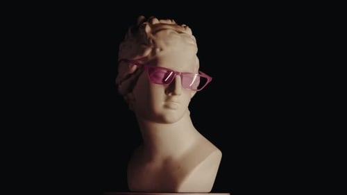 Closeup Shot Ancient Marble Bust Statue of Roman Era Woman in Pink Glasses Spinning Round on a