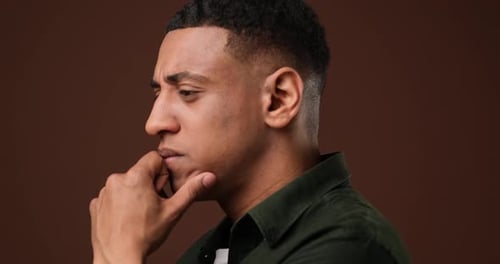 Pensive Man Thinking Deeply in a Close-Up Portrait