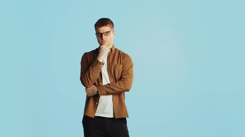 Man Thinking and Getting an Idea on Blue