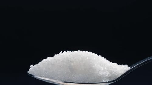 Closeup on a Blackblue Background White Crumbly Granulated Sugar Lies on It Crystal Sugar Spills