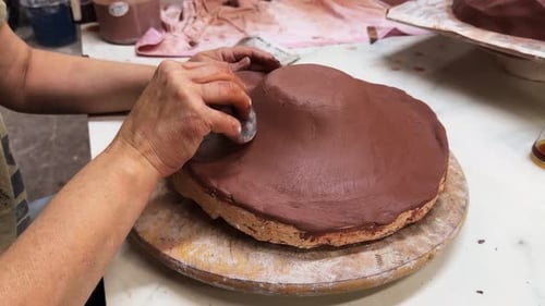 Working With Clay In Ceramic Workshop 5