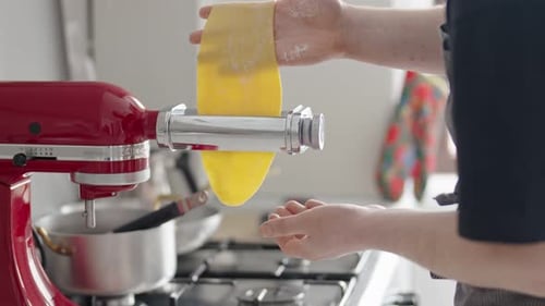 Adult Making Pasta Dough with Mixer Attachment