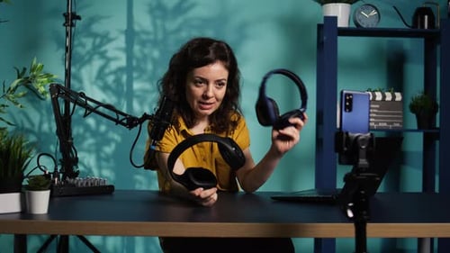 Woman Vlogging, Comparing Wireless Headphones in Home Studio